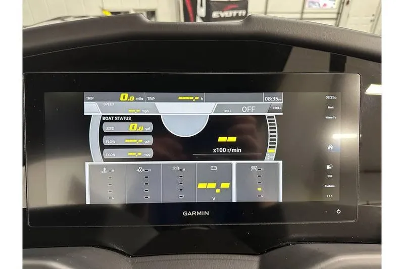 Slide: The Image of Garmin display in 2026 Evotti 723CS showing boat status and trip information. - 30