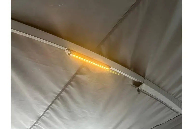 Slide: The Image of LED light strip on Evotti 723CS ceiling, 2026 model, emitting warm glow. - 33