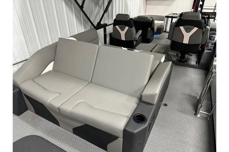 Slide: The Image of Interior of 2026 Evotti 723CS boat with modern seating and cup holders. - 46