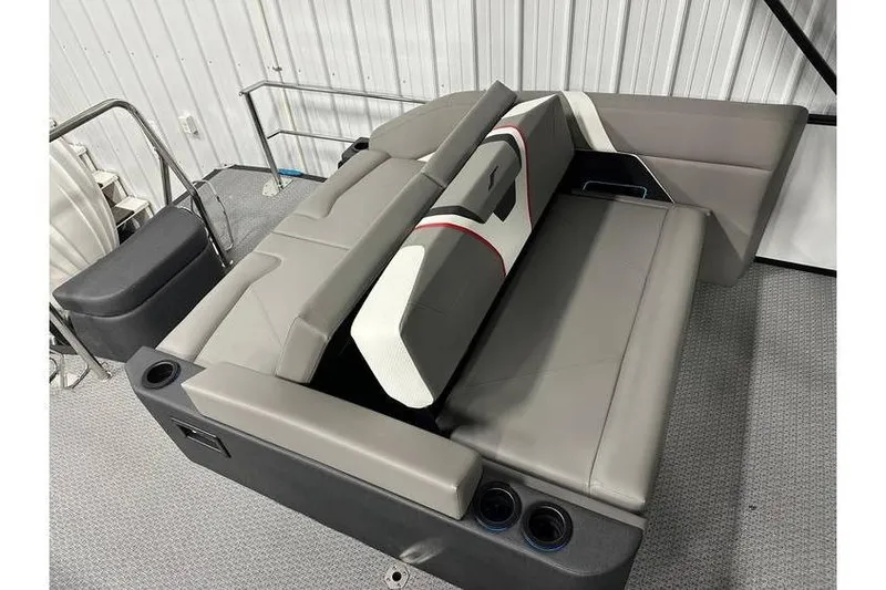 Slide: The Image of Gray seating area in a 2026 Evotti 723CS boat, featuring cup holders and modern design. - 47