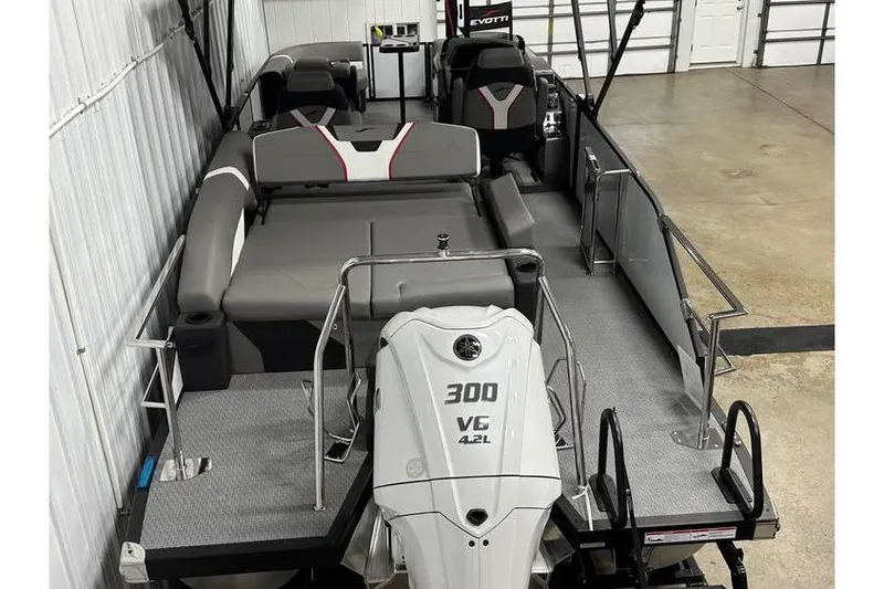 Slide: The Image of 2026 Evotti 723CS boat with 300 V6 engine, sleek interior design, and modern seating. - 52