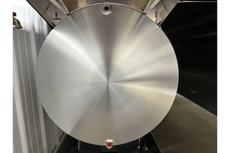 Slide: The Image of Evotti 723CS 2026 model, featuring a sleek, circular metallic design in an industrial setting. - 53