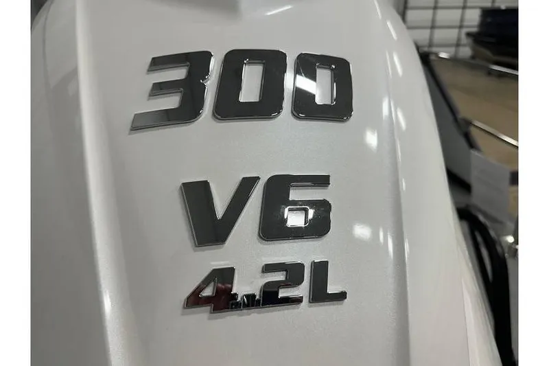 Slide: The Image of Evotti 723CS 2026 engine cover with 300 V6 4.2L badge in metallic finish. - 54