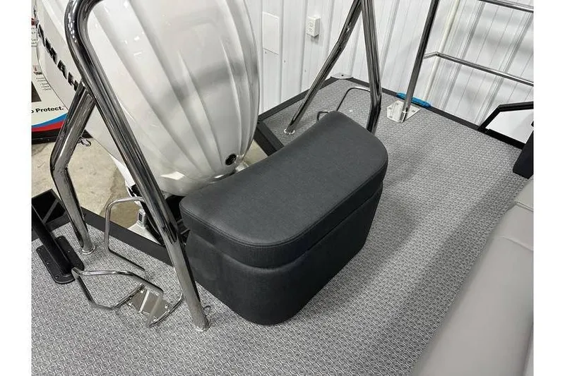 Slide: The Image of 2026 Evotti 723CS boat interior with cushioned seat and stainless steel railings. - 58