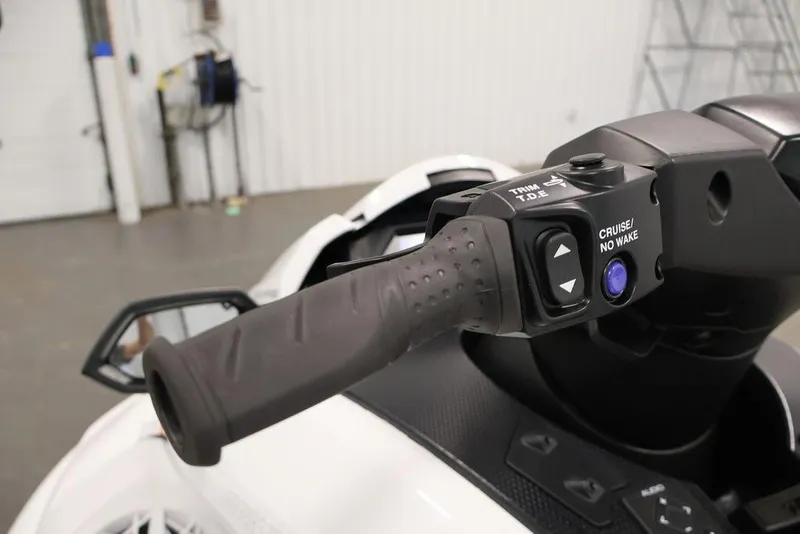 Slide: The Image of Handlebar controls of 2026 Yamaha WaveRunner FX Cruiser SVHO, featuring cruise and trim buttons. - 11