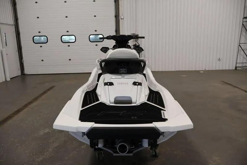 Slide: The Image of 2026 Yamaha WaveRunner FX Cruiser SVHO in a garage, rear view. - 8