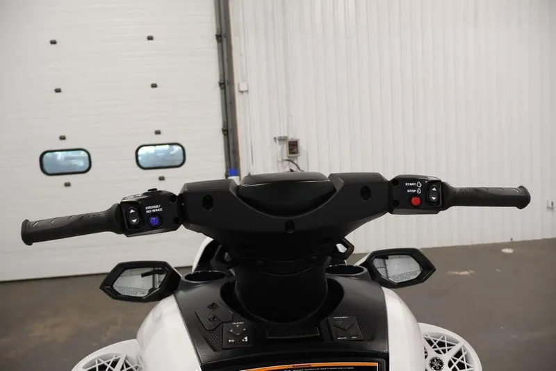 Slide: The Image of 2026 Yamaha WaveRunner FX Cruiser SVHO handlebars and controls in a garage setting. - 9