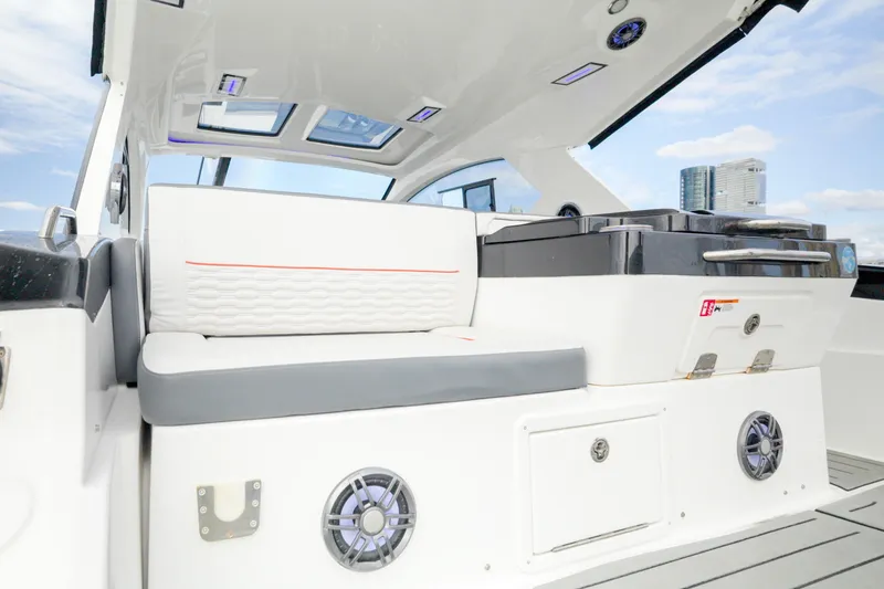Slide: The Image of 2026 Granfort 370 GTX boat interior with modern seating and sleek design. - 10