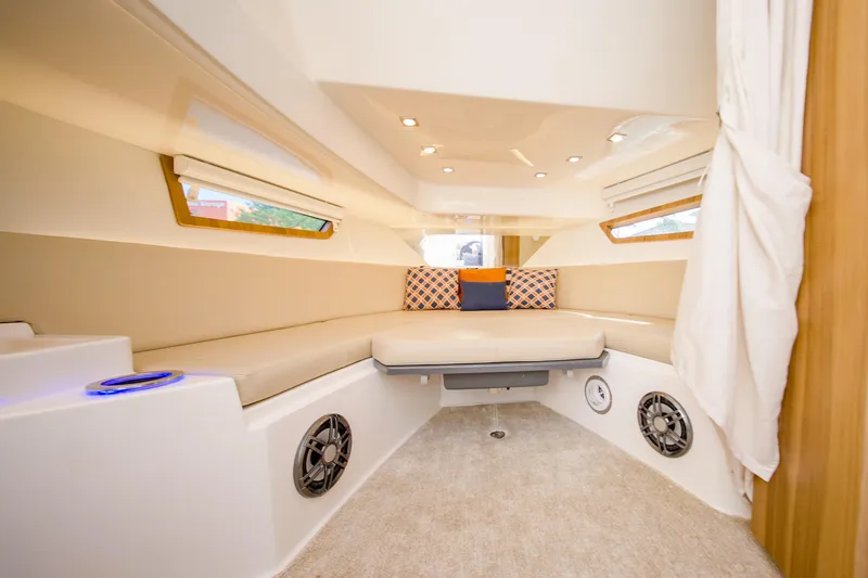 Slide: The Image of Luxurious interior of 2026 Granfort 370 GTX yacht with plush seating and modern design. - 18