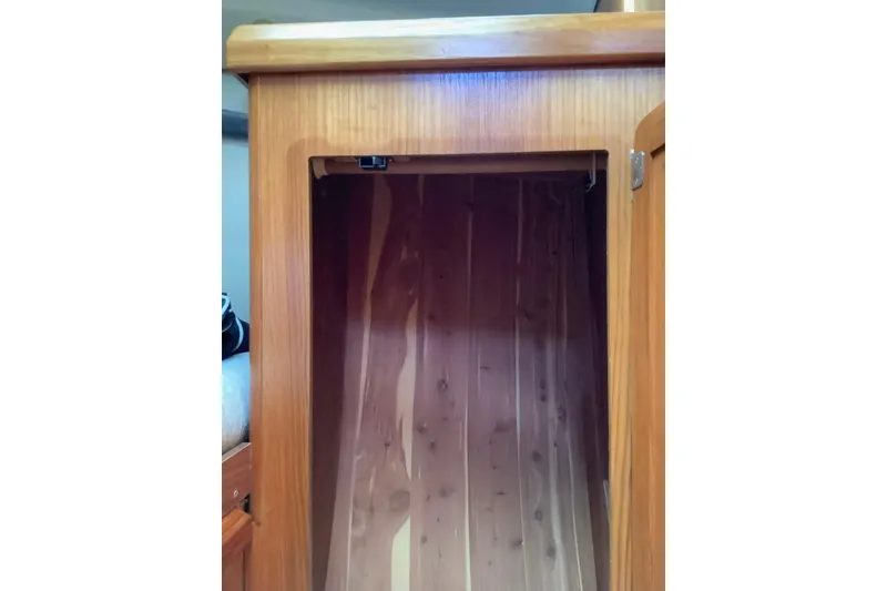 Slide: The Image of Wooden interior cabinet of 1992 Hunter 33.5 sailboat. - 22