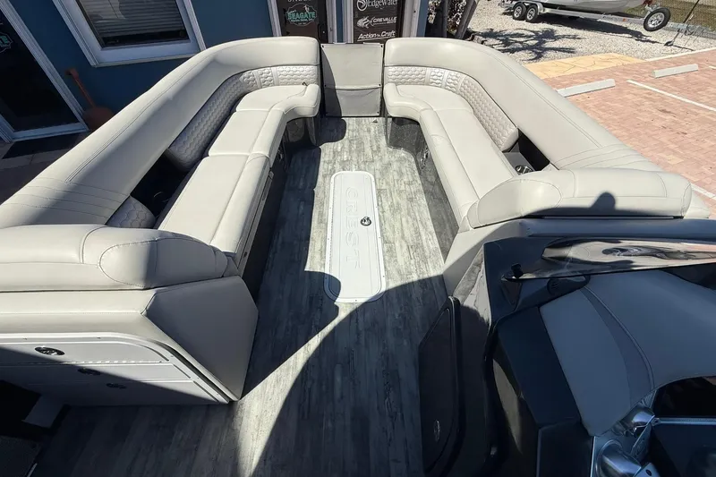 Slide: The Image of 2021 Crest Caribbean Platinum 250 SLC boat interior with luxurious seating and modern design. - 12