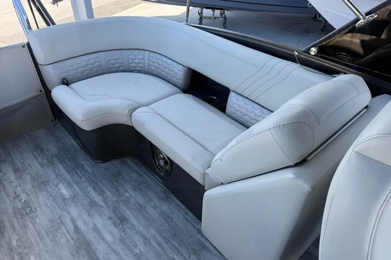 Slide: The Image of Luxurious seating on 2021 Crest Caribbean Platinum 250 SLC pontoon boat. - 24