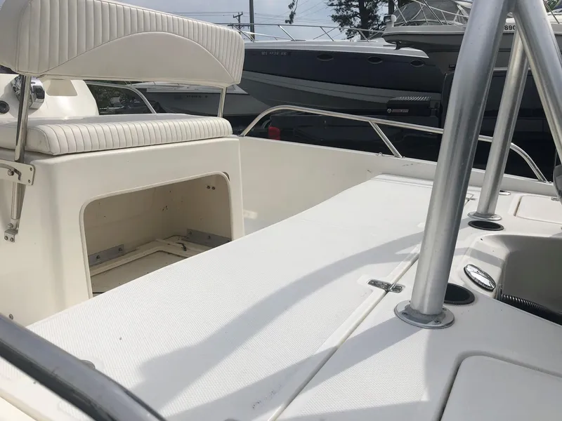 Slide: The Image of Boston Whaler 200 Dauntless 2012, interior view with seating and storage. - 5