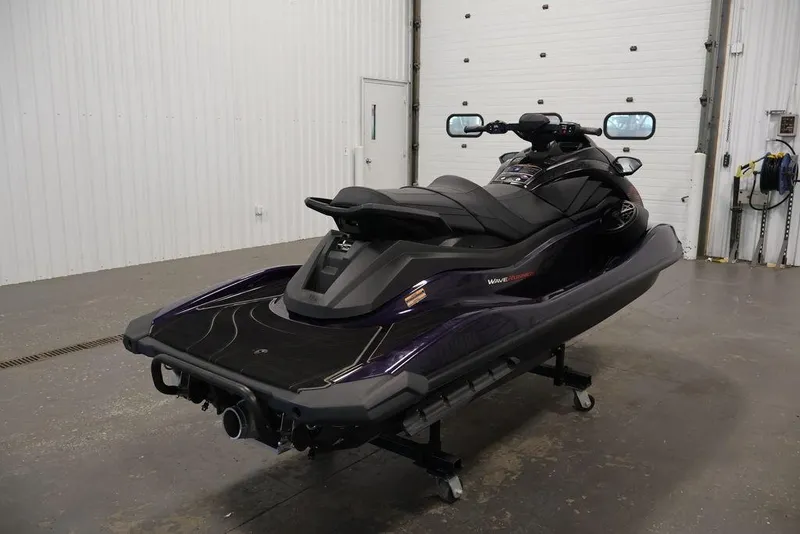 Slide: The Image of 2026 Yamaha WaveRunner GP HO in sleek dark blue, side view. - 15