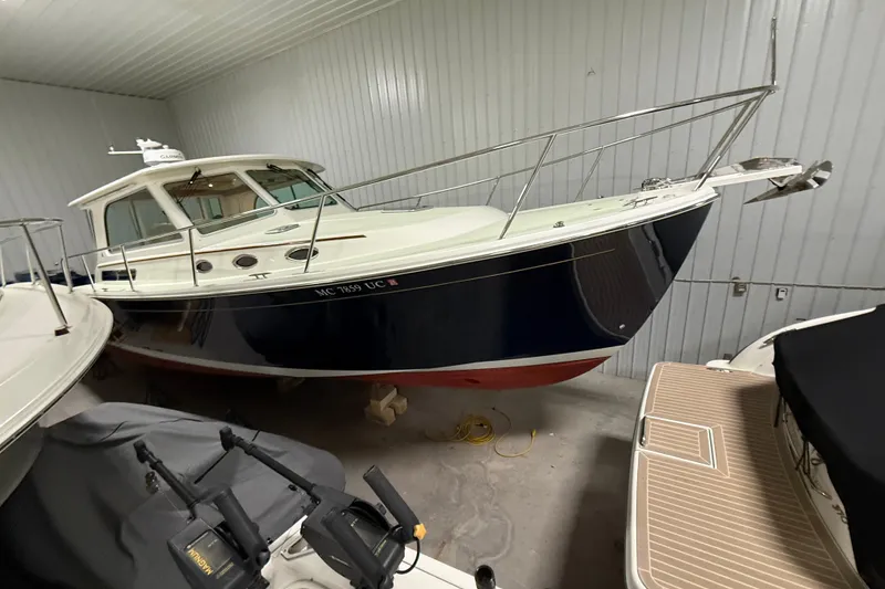 Slide: The Image of 2017 Back Cove 37 boat in storage, featuring sleek design and modern amenities. - 3
