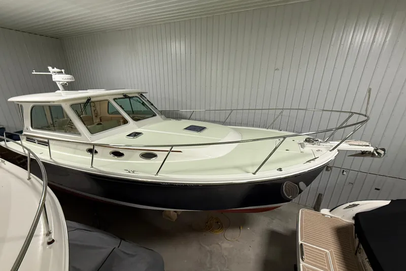 Slide: The Image of 2017 Back Cove 37 boat in indoor storage, side view. - 4