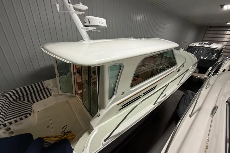 Slide: The Image of 2017 Back Cove 37 yacht in storage, featuring sleek design and modern amenities. - 5