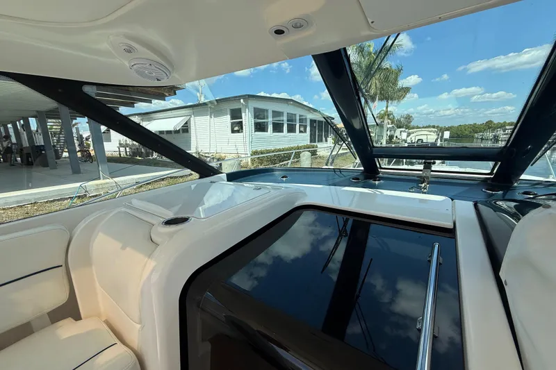 Slide: The Image of 2004 Tiara Yachts 3600 Sovran interior with panoramic windows and sleek design. - 17