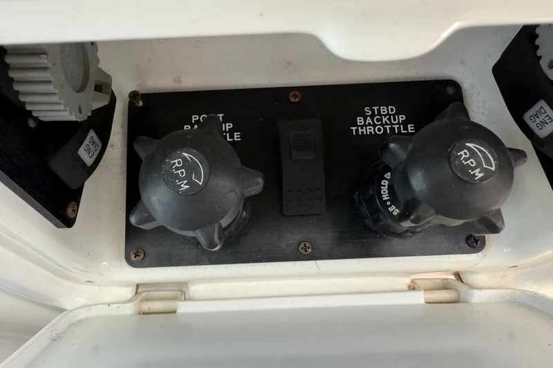 Slide: The Image of Backup throttle controls on a 2004 Tiara Yachts 3600 Sovran. - 23