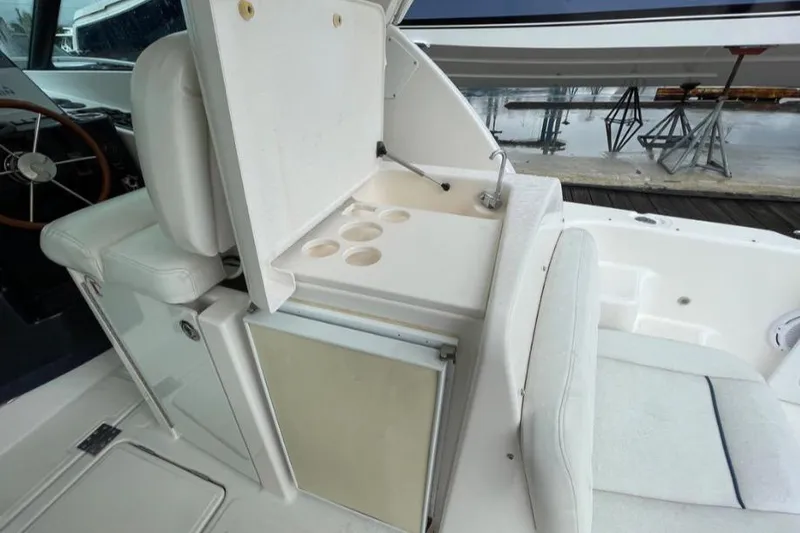 Slide: The Image of 2004 Tiara Yachts 3600 Sovran interior with seating and storage compartments. - 30