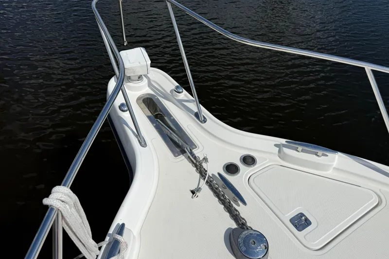 Slide: The Image of Bow of 2004 Tiara Yachts 3600 Sovran with anchor chain and railing. - 33