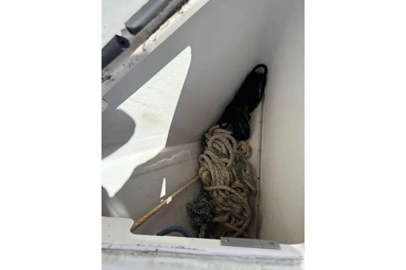 Slide: The Image of Storage compartment with ropes on a 2004 Tiara Yachts 3600 Sovran. - 34