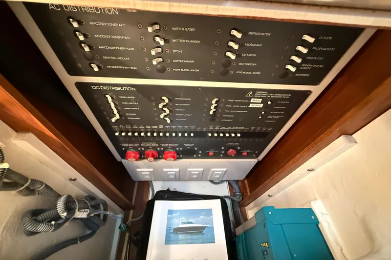 Slide: The Image of Electrical control panel on a 2004 Tiara Yachts 3600 Sovran boat. - 66