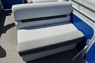 Slide: The Image of 2021 Godfrey Sweetwater 2286 C boat seat with gray upholstery and blue accents. - 11