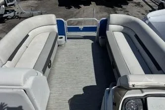 Slide: The Image of 2021 Godfrey Sweetwater 2286 C pontoon boat interior with spacious seating. - 12