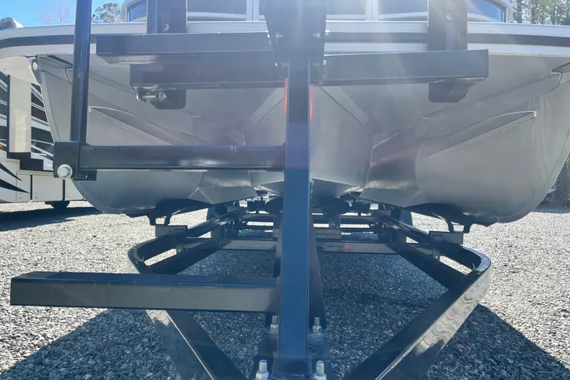 Slide: The Image of 2022 Bennington 23LT pontoon boat on trailer, viewed from below. - 10