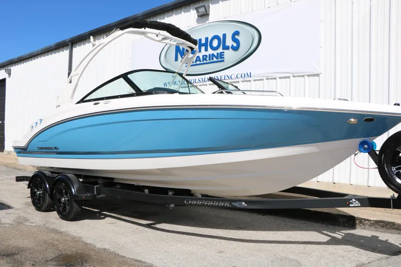 Slide: The Image of 2026 Chaparral 23 SSi boat on trailer at Nichols Marine dealership. - 2
