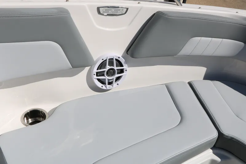 Slide: The Image of Interior seating of 2026 Chaparral 23 SSi boat with speaker and cup holder. - 20
