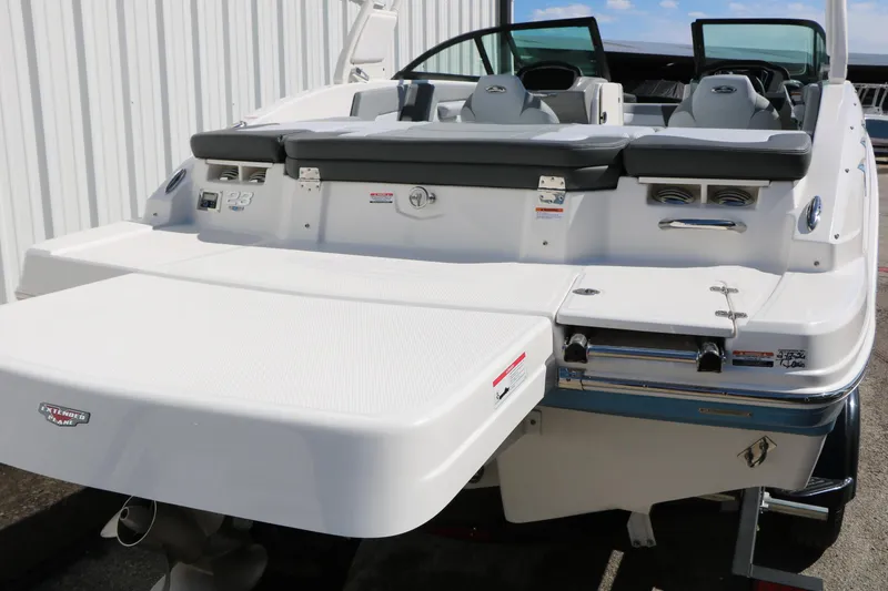 Slide: The Image of 2026 Chaparral 23 SSi boat with extended swim platform and sleek design. - 8