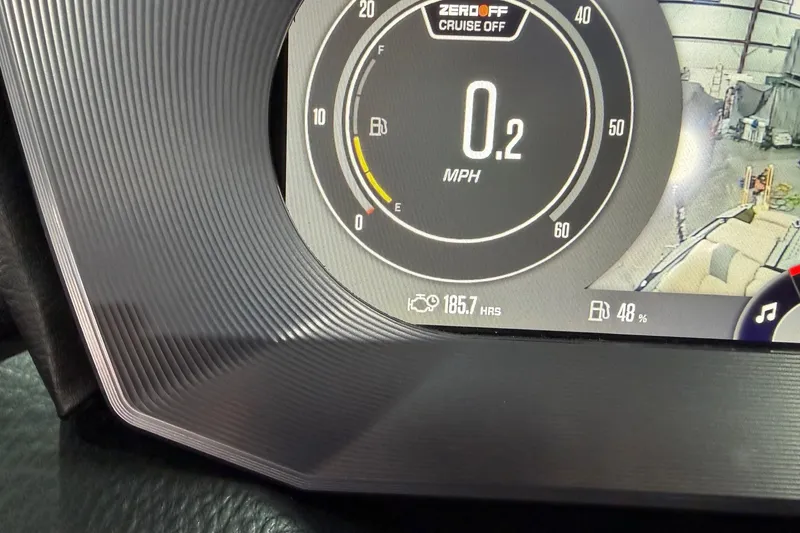 Slide: The Image of Dashboard of 2022 MasterCraft X26 showing speed, fuel, and engine hours. - 13