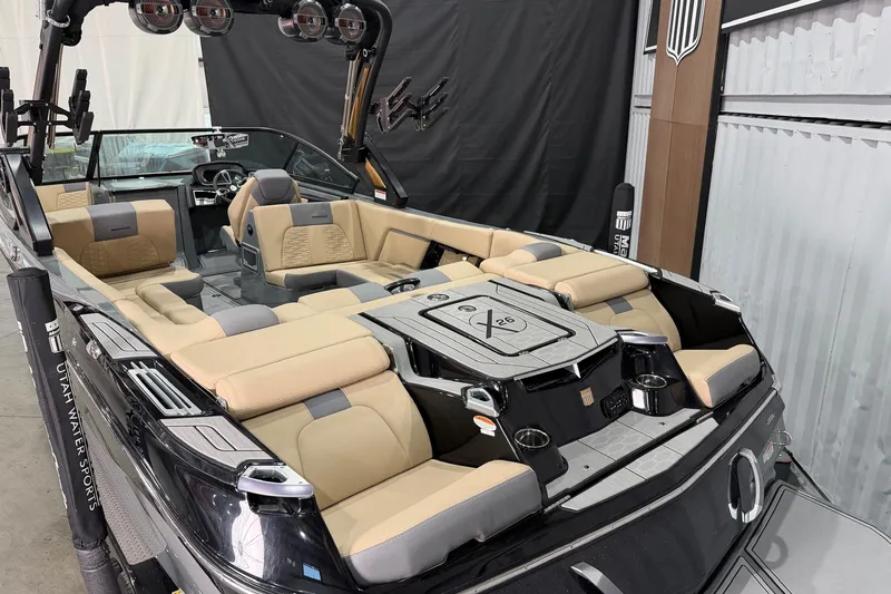 Slide: The Image of 2022 MasterCraft X26 boat interior with luxurious seating and modern design. - 3