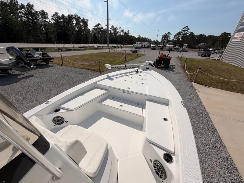 Slide: The Image of 2019 BlackJack 224 boat parked on gravel lot. - 14