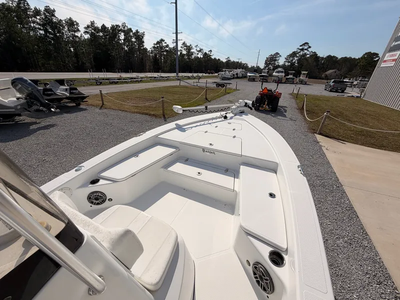 Slide: The Image of 2019 BlackJack 224 boat parked on gravel lot. - 15