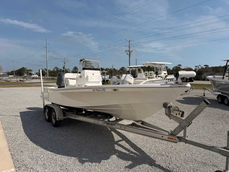 Slide: The Image of 2019 BlackJack 224 boat on trailer outdoors. - 3