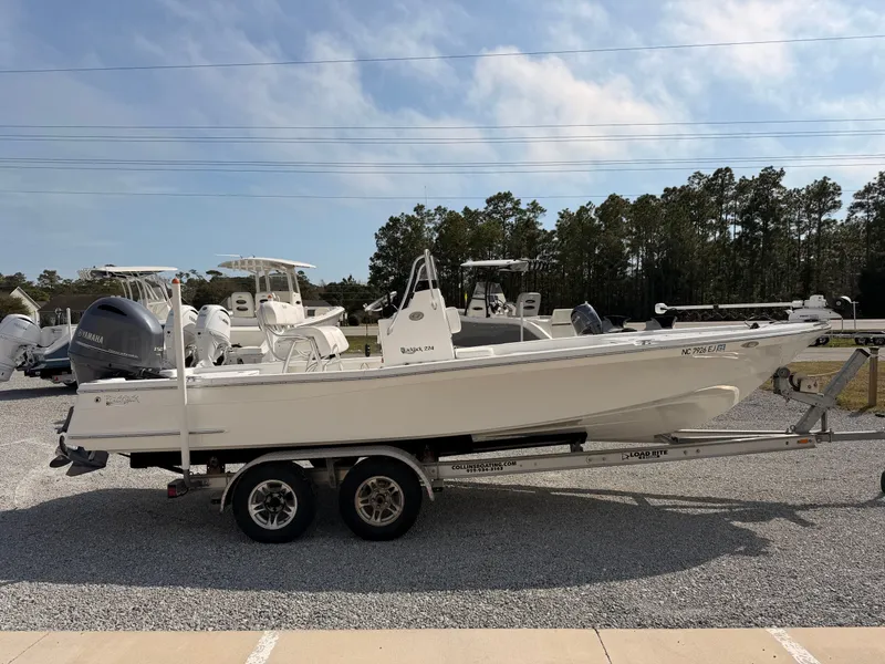 Slide: The Image of 2019 BlackJack 224 boat on trailer outdoors. - 4