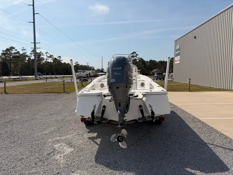 Slide: The Image of Rear view of a 2019 BlackJack 224 boat with outboard motor. - 6