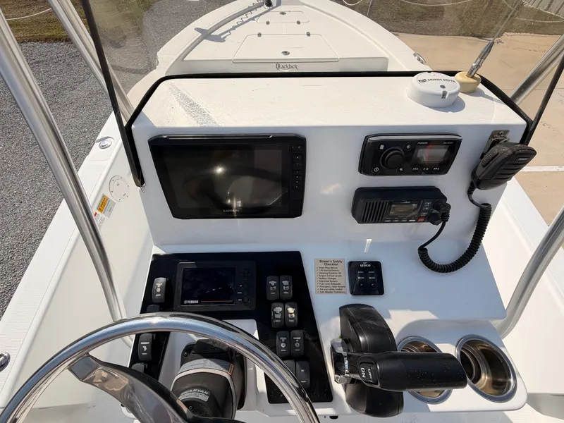 Slide: The Image of Control console of a 2019 BlackJack 224 boat. - 8