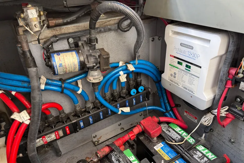 Slide: The Image of Electrical and plumbing system of a 2003 Sea Ray 300 Sundancer boat. - 50