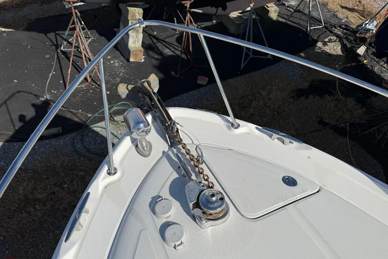 Slide: The Image of Bow of a 2003 Sea Ray 300 Sundancer with anchor and railing. - 7