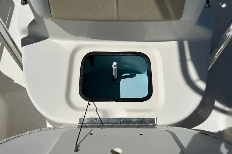 Slide: The Image of 2021 Bulls Bay 2200 boat livewell with open lid and seating area. - 15