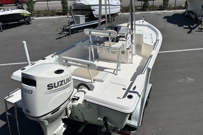 Slide: The Image of 2021 Bulls Bay 2200 boat with Suzuki 150 outboard motor on trailer. - 7