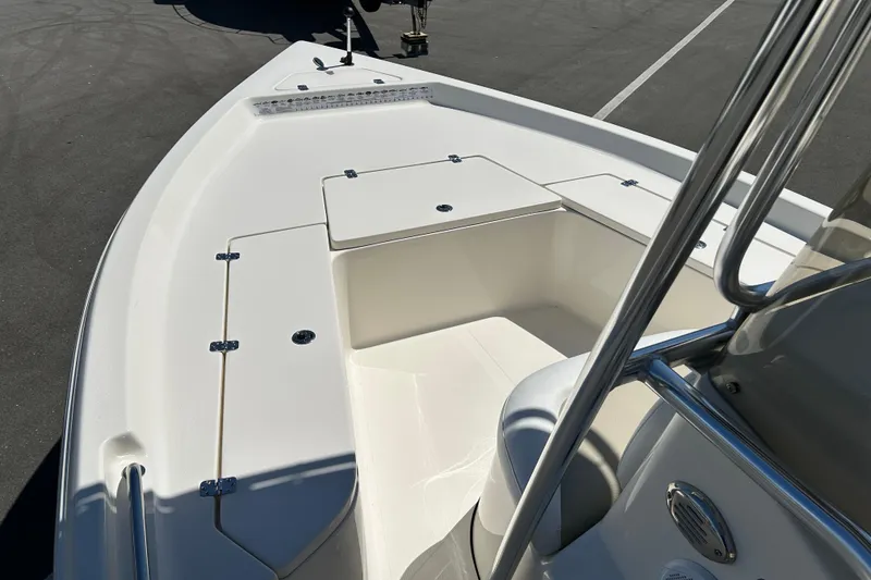 Slide: The Image of 2021 Bulls Bay 2200 boat interior with seating and storage compartments. - 8