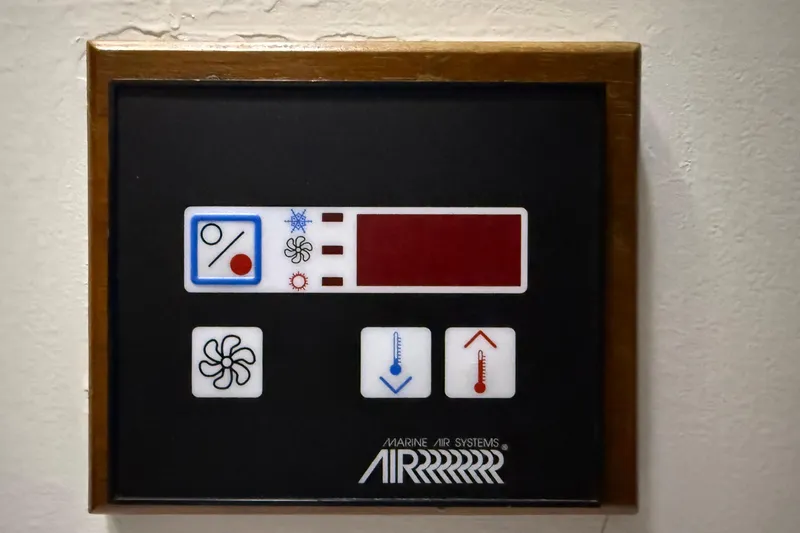 Slide: The Image of Marine air systems control panel on a 1991 Grand Banks 42 Classic yacht. - 71