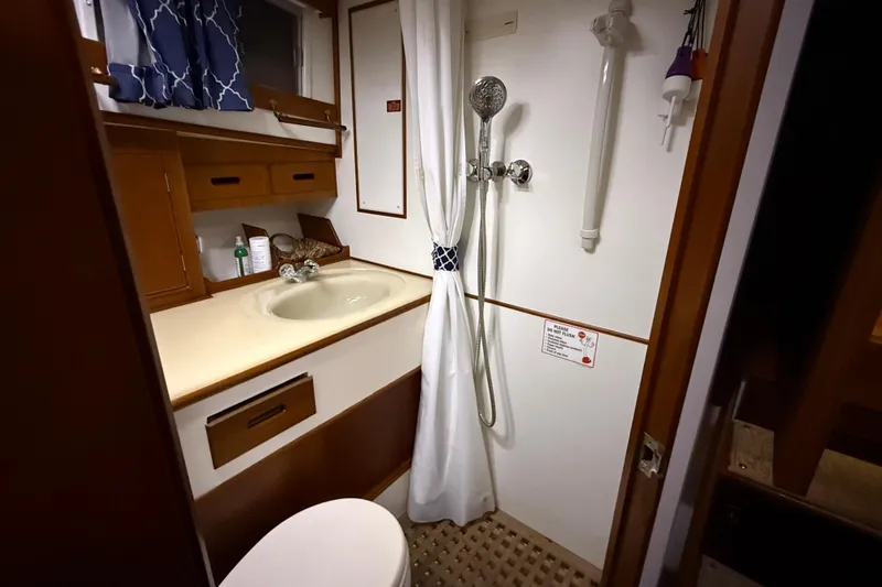 Slide: The Image of Bathroom interior of 1991 Grand Banks 42 Classic yacht with shower and sink. - 76