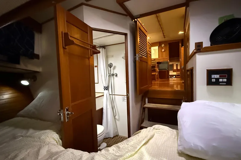 Slide: The Image of Interior of 1991 Grand Banks 42 Classic yacht, featuring cozy cabin and bathroom. - 69