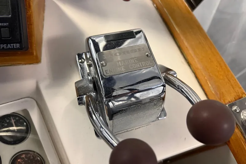Slide: The Image of Marine engine control lever on 1991 Grand Banks 42 Classic yacht. - 90